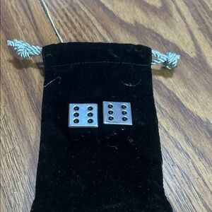 Heavy Metal Dice in black velvet drawstring bag.